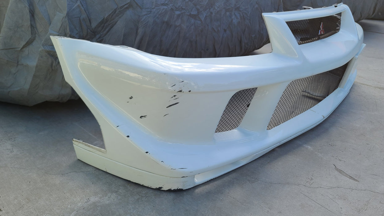 Mitsubishi Lancer Evolution CP9A Evo 6.5 TME Tommi Makinen Edition Front Bumper MR108637 MR511735 MR566814 MR511957 MR533169 MR533173 MR415516 MR533164 MR533174 MR533469